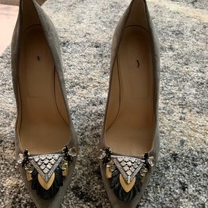 Embellished toe. Grey suede. Gold heel details